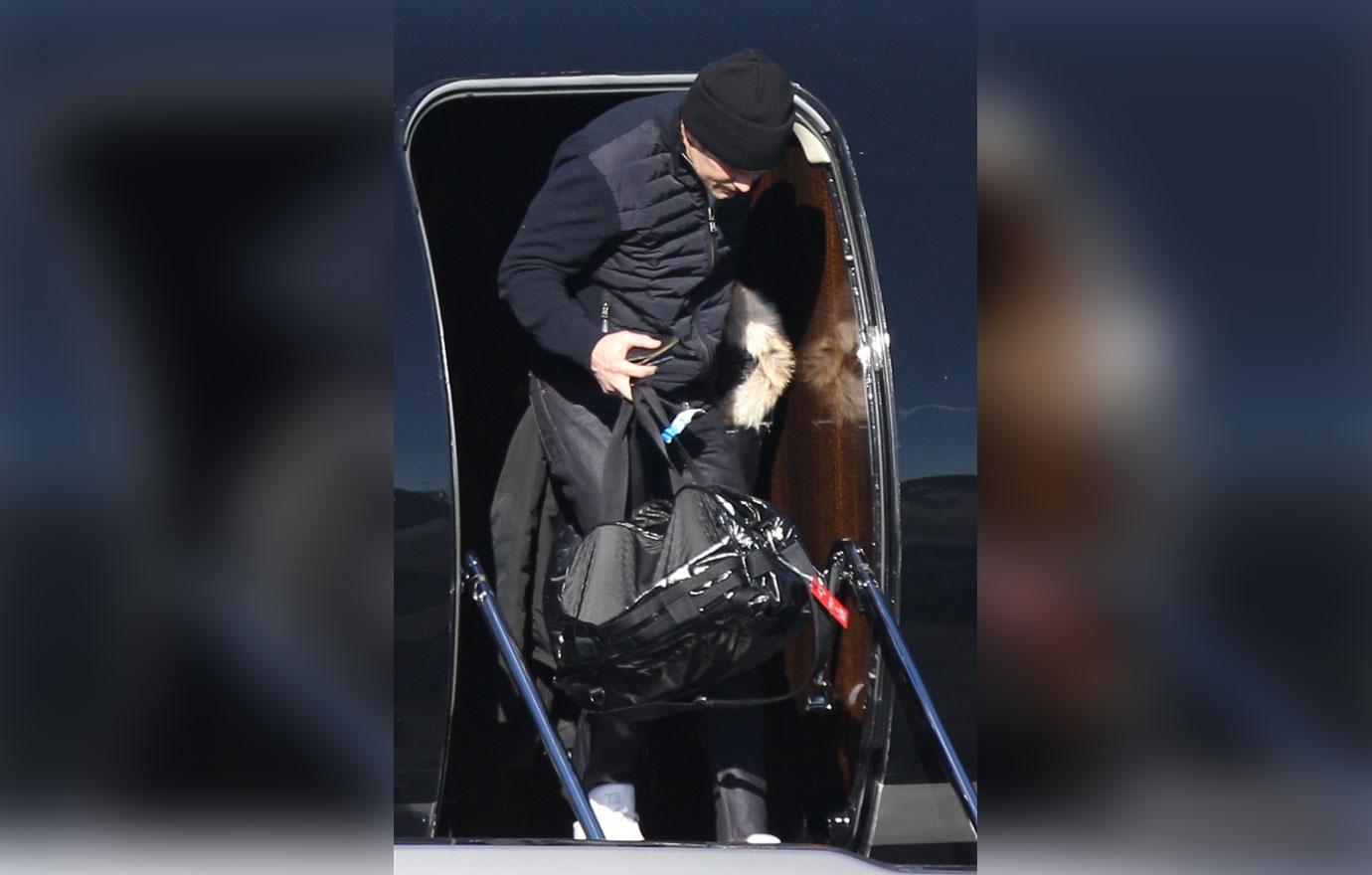 *EXCLUSIVE* Tom Brady and Gisele Bundchen land back in Boston with family after losing Super Bowl LII **WEB EMBARGO UNTIL 4AM PST ON 02/06/18**