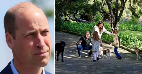 Photo of Prince William and a picture of Prince Harry, Meghan Markle, Archie and Lilibet