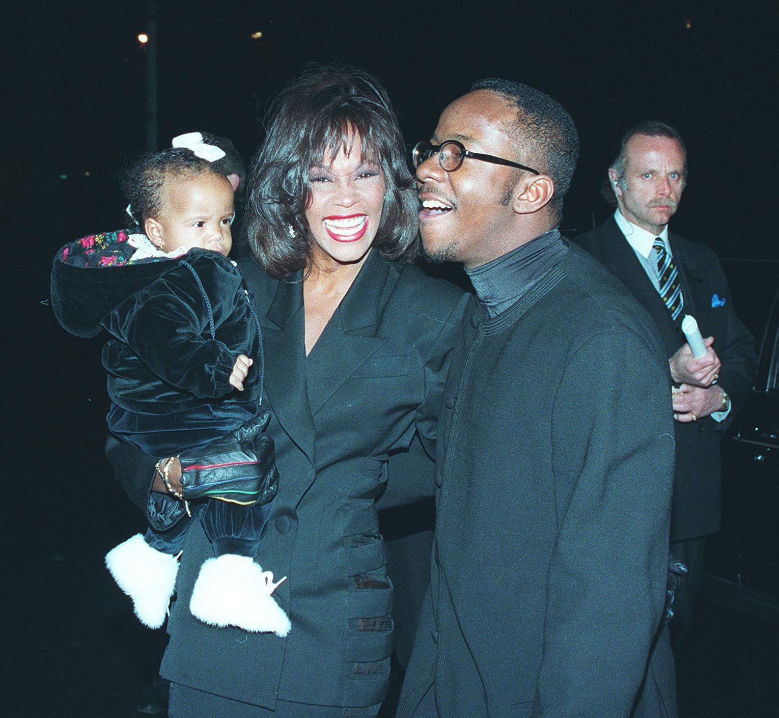 Whitney Houston, Bobby Brown and daughter at Bobby&#8217;s 25th Birthday in 1994 in NYC