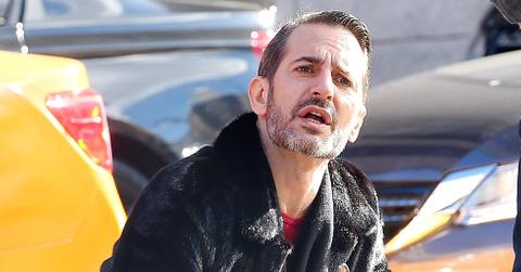 Marc Jacobs stops to do a quick impromptu photo shoot with his bull terrier