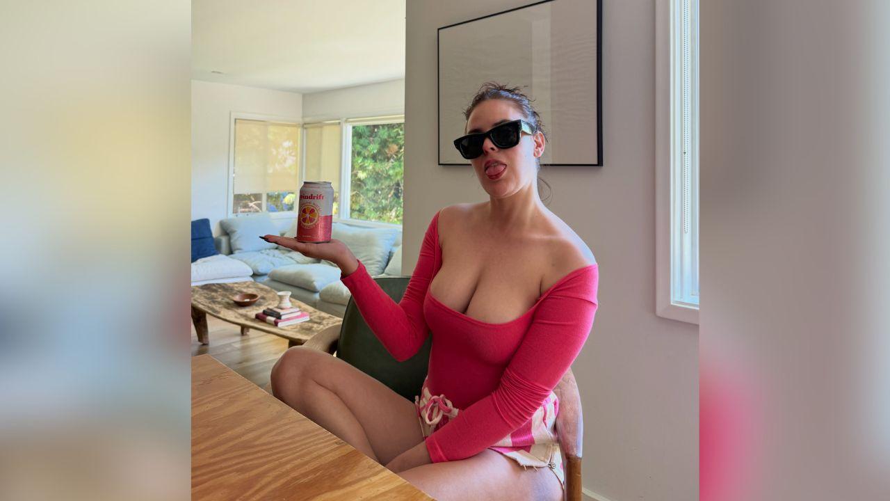 Image of The daughter of Bruce Willis and Demi Moore paired her revealing bodysuit with tiny shorts and black sunglasses.