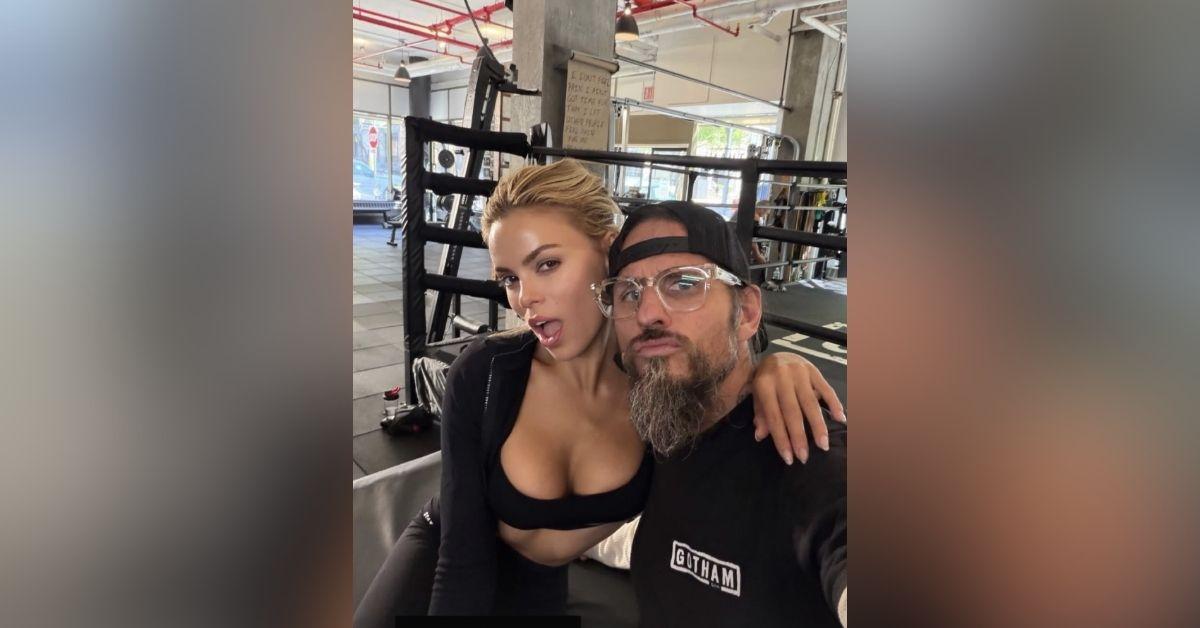 image of Brooks Nader shared steamy gym selfies while showing off her toned physique in black activewear.