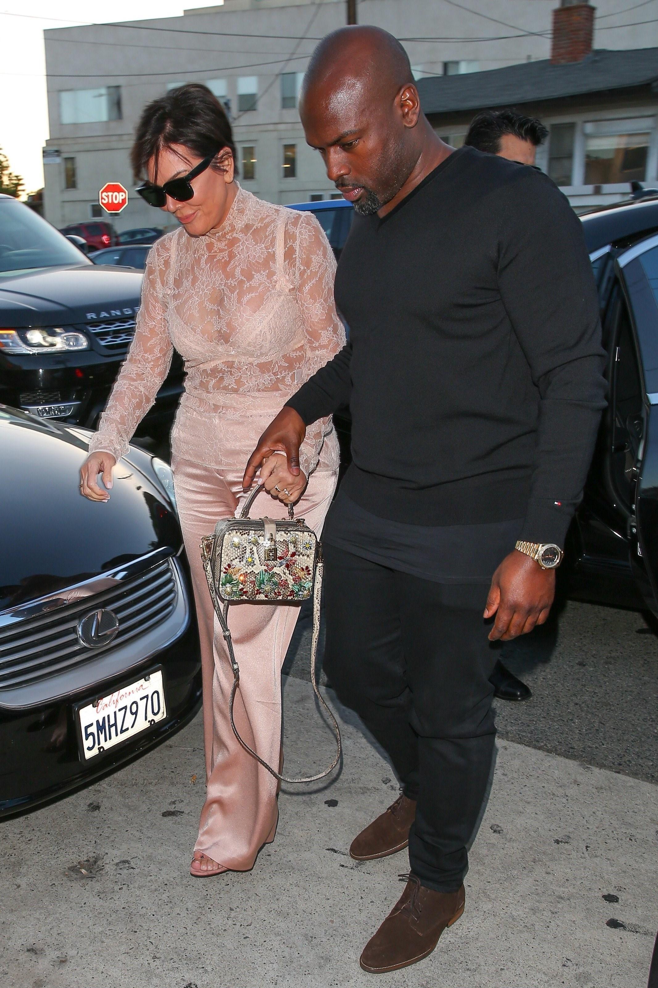 *EXCLUSIVE* Kris Jenner keeps it sheer in nude as she arrives for a dinner date with Corey Gamble