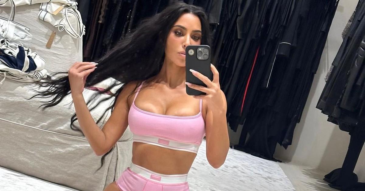 Kylie Jenner spills out of plunging black bra in racy pic, but Kardashian  fans say Kim's trying to 'steal her spotlight