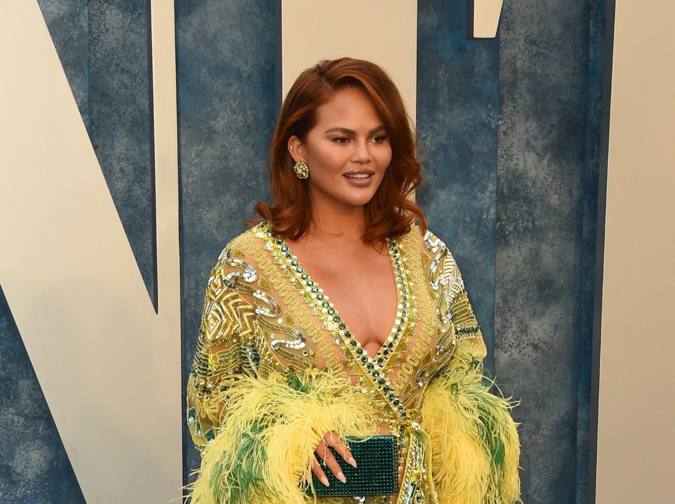 chrissy teigen looks relaxed after dna test mishap spiraling