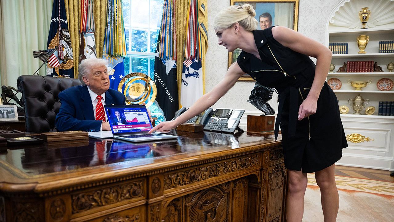 photo of A journalist referred to Natalie Harp as Donald Trump's 'comfort blanket' since she goes everywhere with the president.