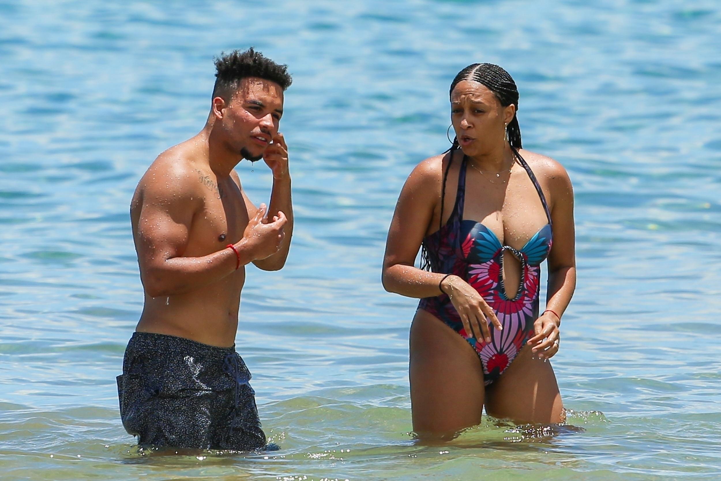 Tia Mowry Shows Off 20 Pound Weight Loss In A Low Cut Swim Suit