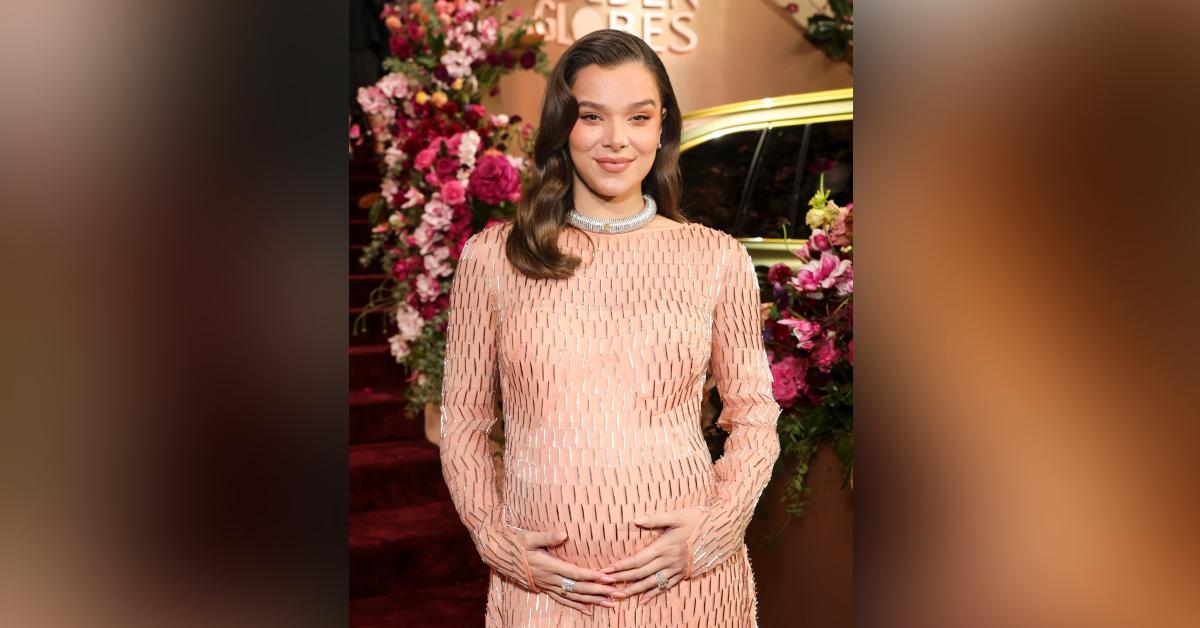 Photo of Hailee Steinfeld cradled her baby bump at the 2026 Golden Globes.