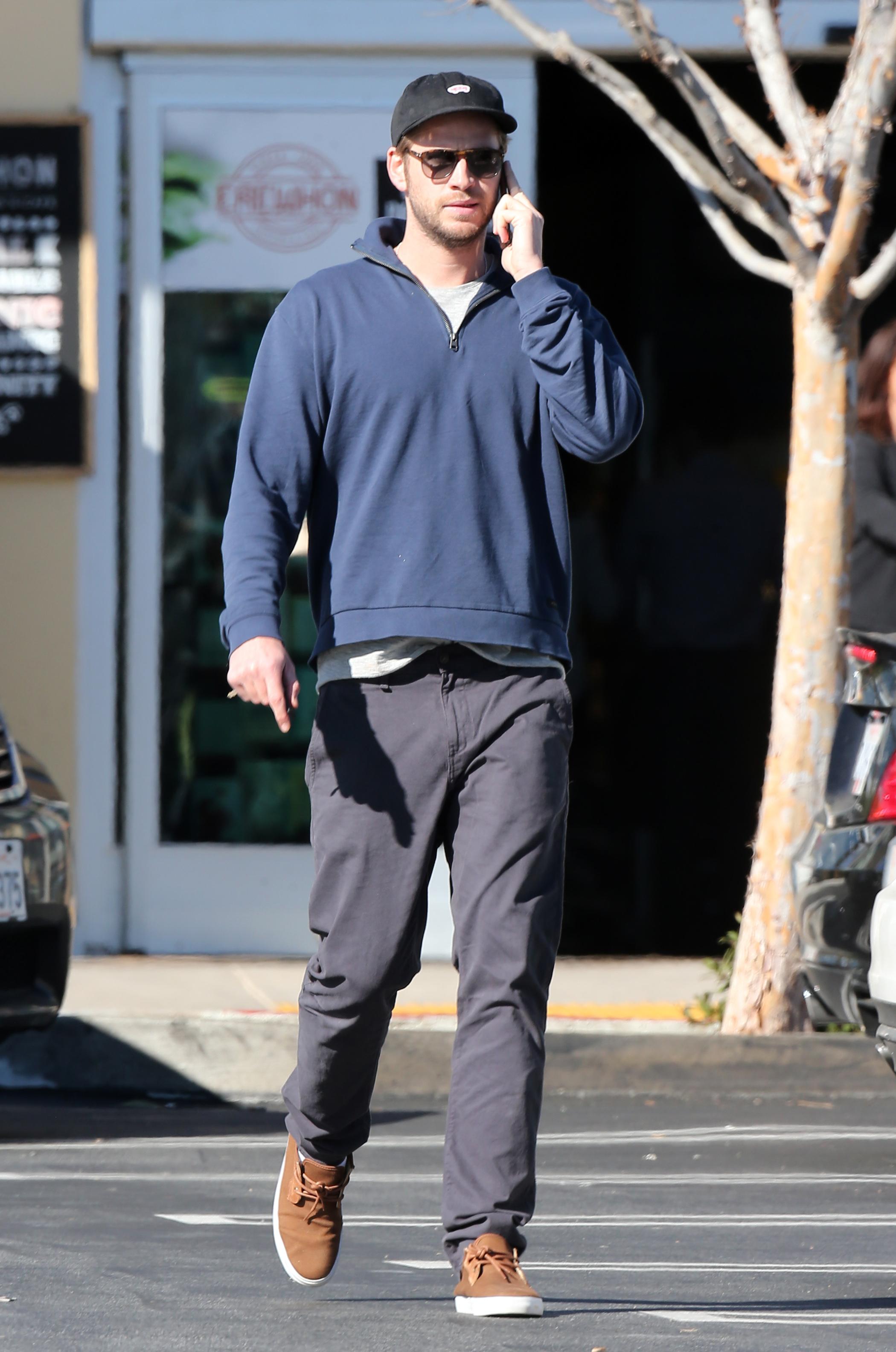 EXCLUSIVE: Liam Hemsworth shopping at an organic grocery store in Los Angeles amid reports he is engaged to Miley Cyrus again