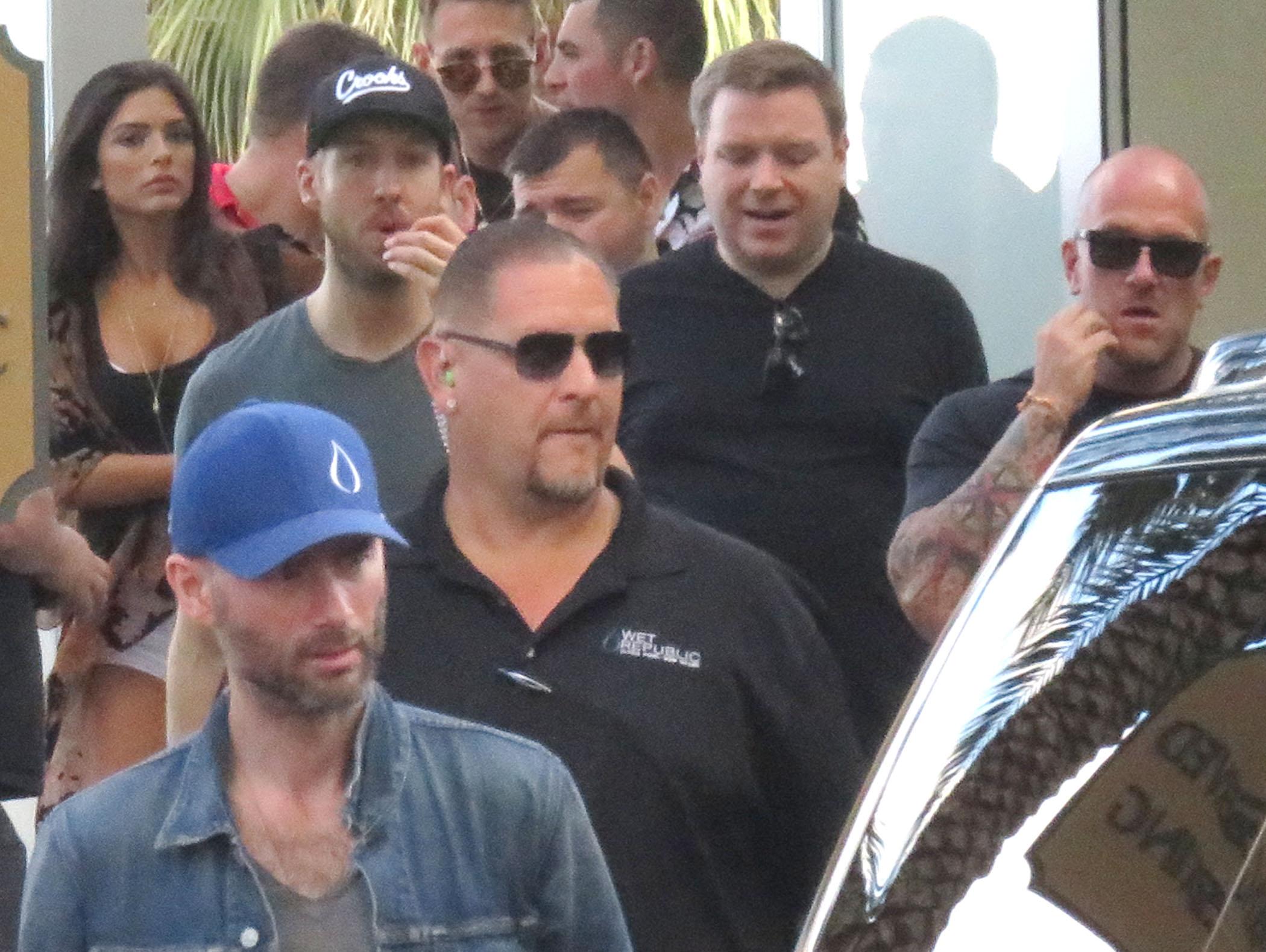 EXCLUSIVE: Calvin Harris leaves Wet Republic pool together with mystery woman who gets into his car before him in Las Vegas