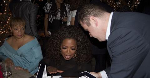 Oprah receiving her Cross Pen
