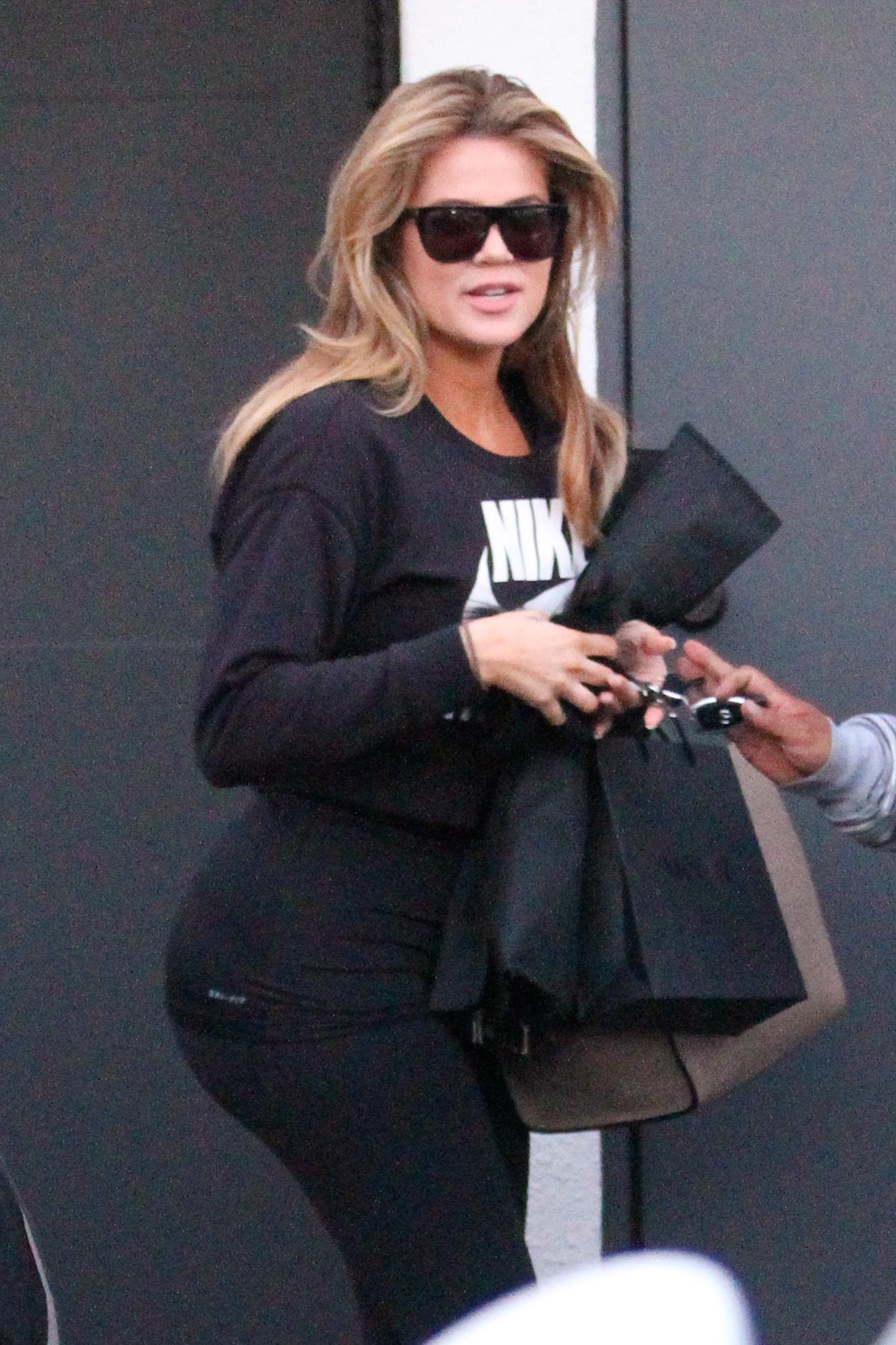 Khloe Kardashian steps out of a 5 hour hair salon visit