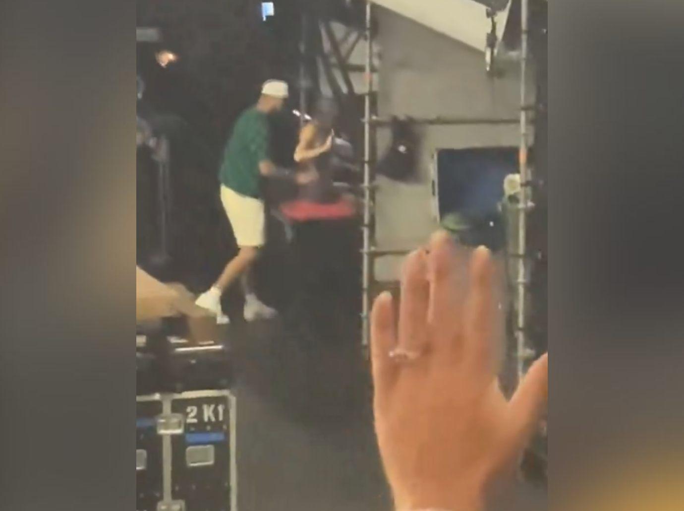 travis kelce holds onto taylor swift waist after concert germany watch