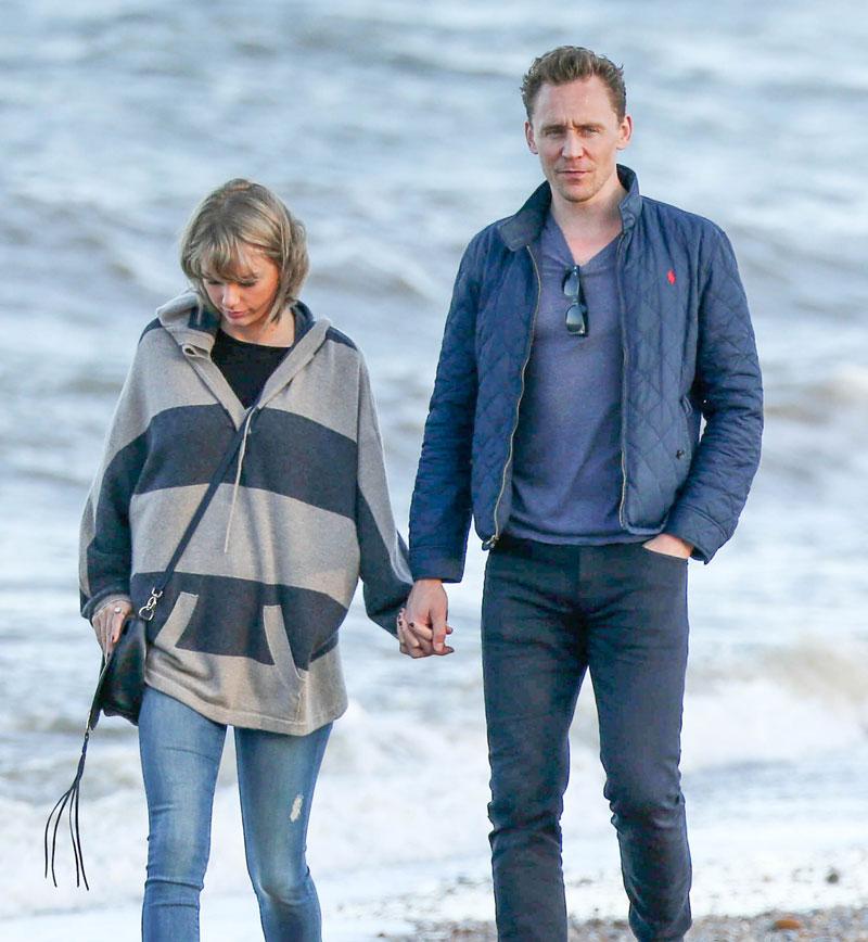 Taylor swift tom hiddleston hold hands cuddle beach date uk photos 05