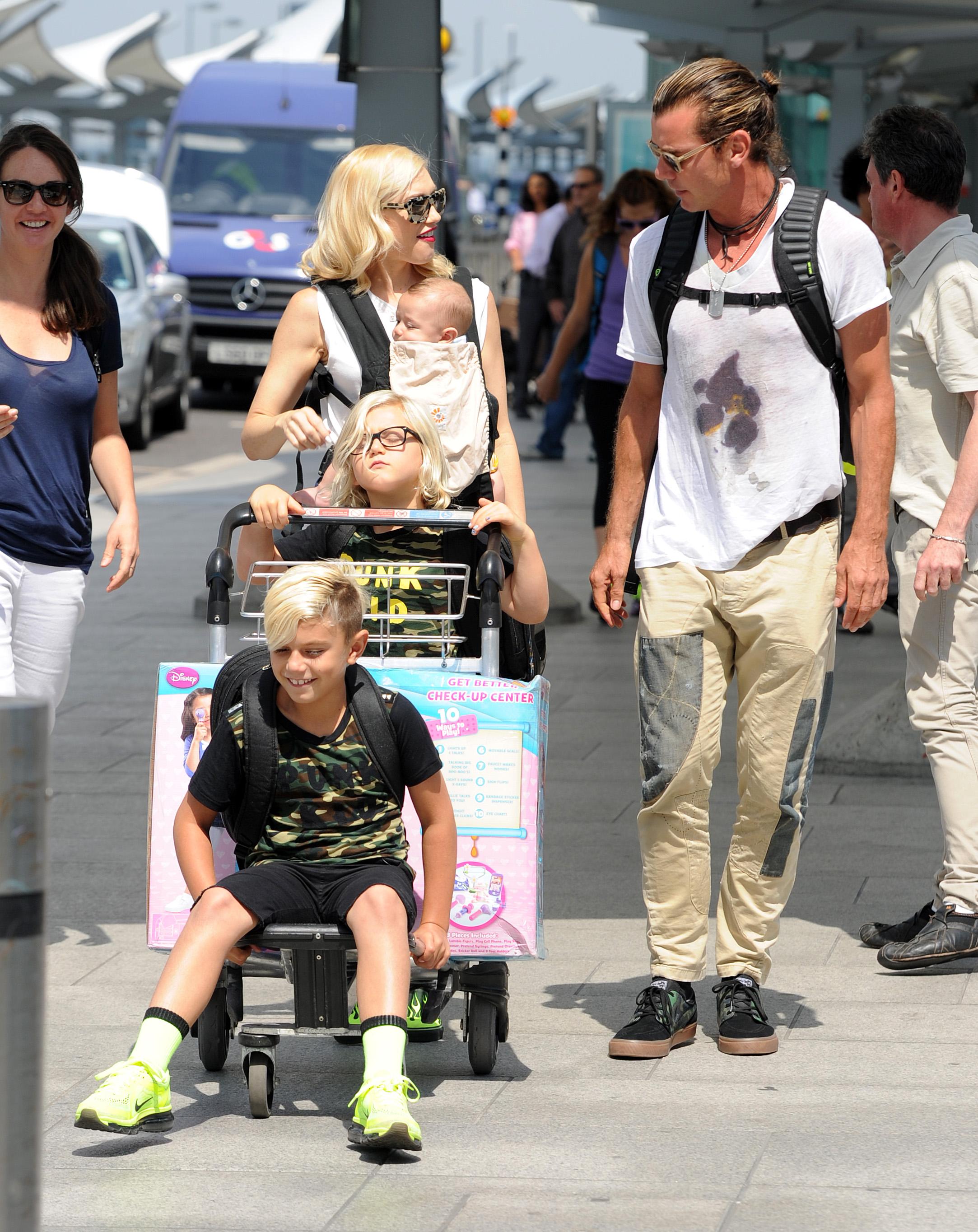 Gwen Stefani and her family at Heathrow airport