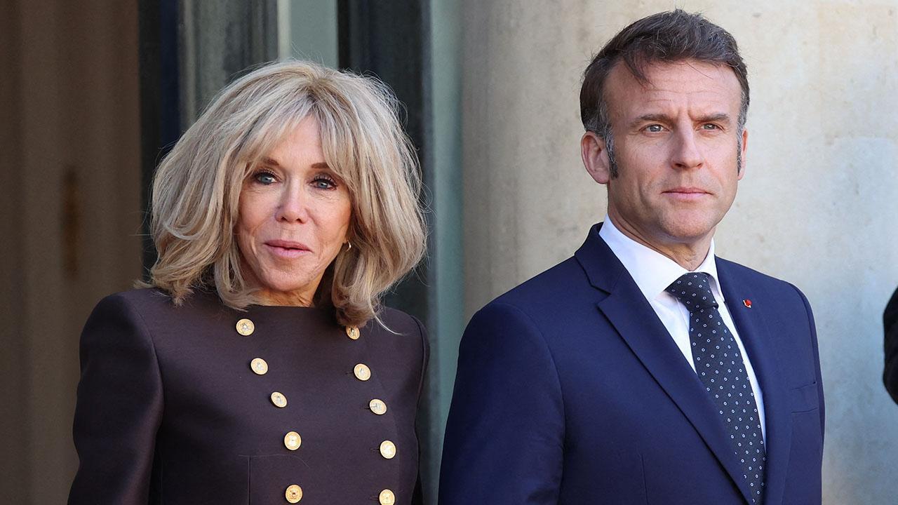 Image of Brigitte Macron and her husband accuse Candace Owens of spreading damaging falsehoods.