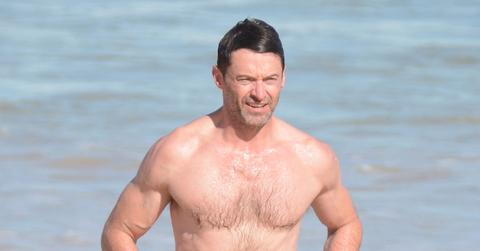 Hugh Jackman goes for a swim at Bondi ahead of concert.