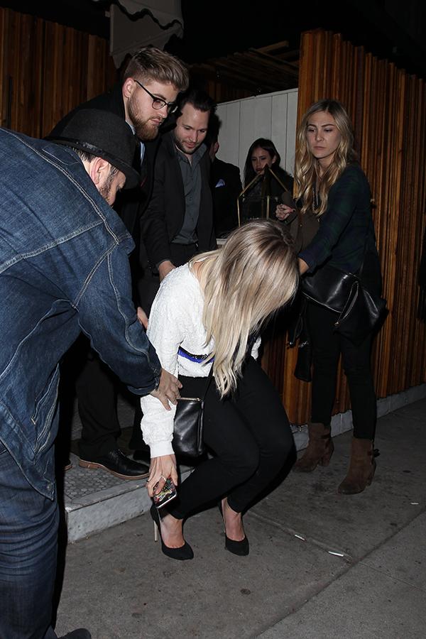 Hilary Duff taking a stumble while leaving The Nice Guy in West Hollywood