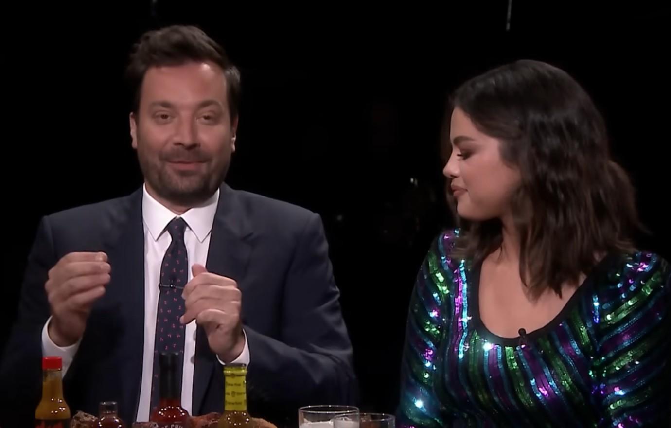 jimmy fallon selena gomez throw up sean evans hot ones killed treasure