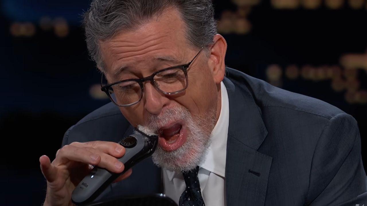 Image of Stephen Colbert shaved his beard during the interview after winning an Emmy.