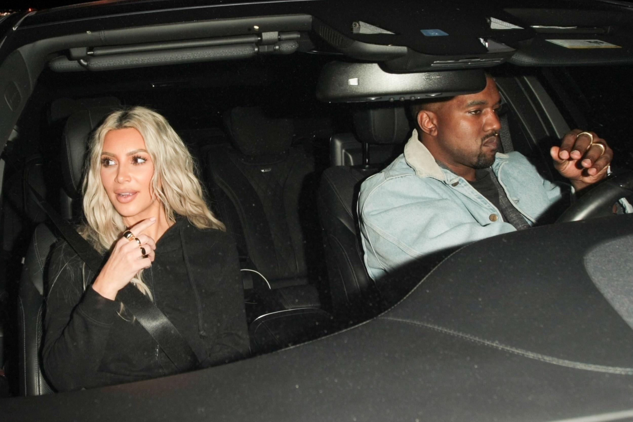 Kim Kardashian and Kanye West exit Craig&#8217;s after a bite