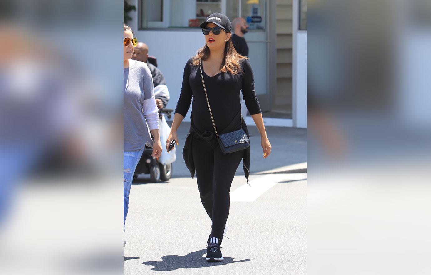 Eva Longoria sports a form-fitting black top with leggings while out  running errands in Beverly