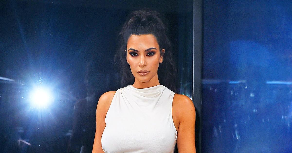 Kim Kardashian shows off her famous butt in skintight black dress for new  Skims ad as fans praise her 'healthier' curves