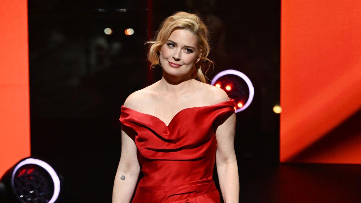 Image of Alexandra Breckenridge walked the runway during the AHA Go Red for Women Red Dress Collection Concert.