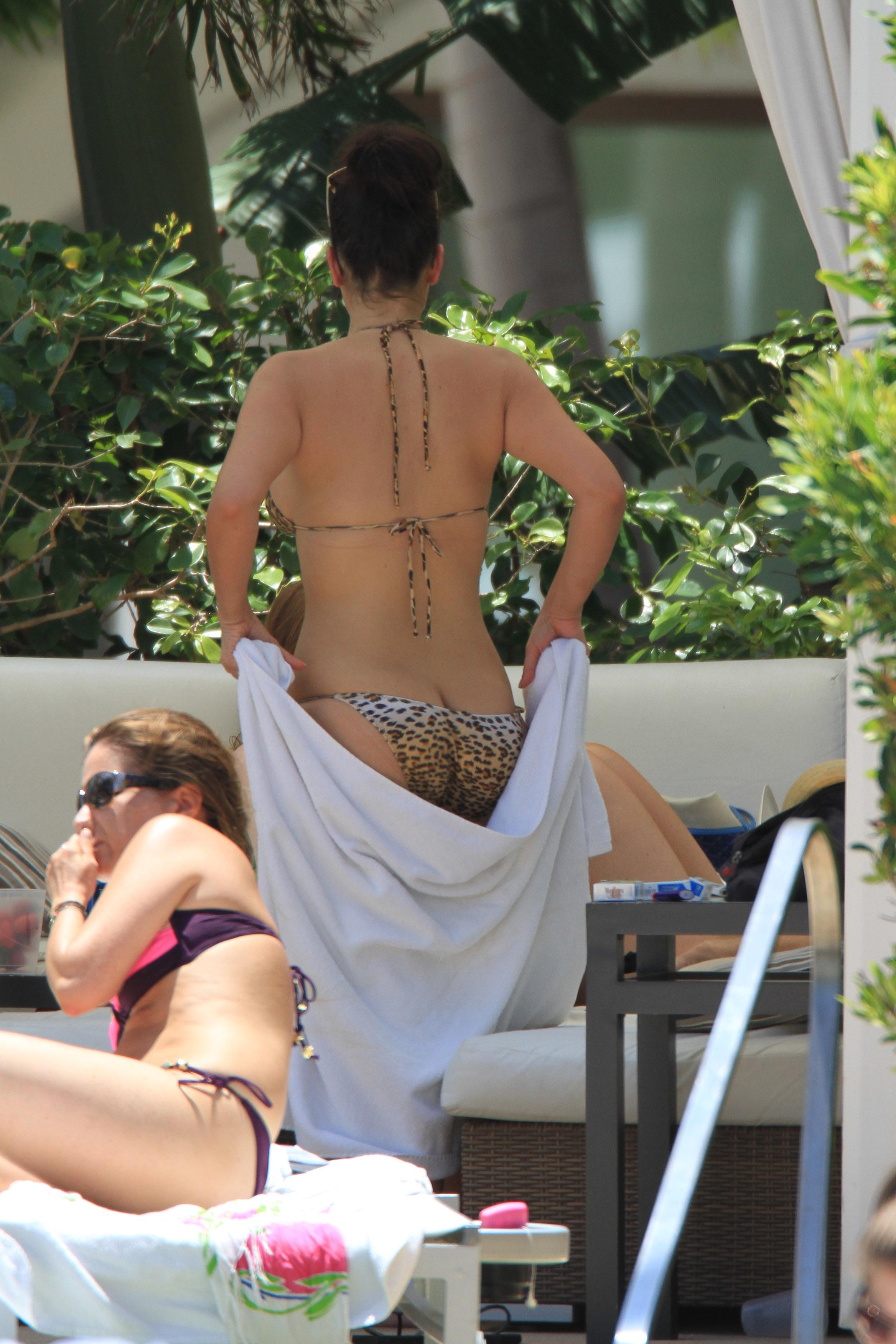 Kim  Kardashian seen bikini pool side in Miami Beach