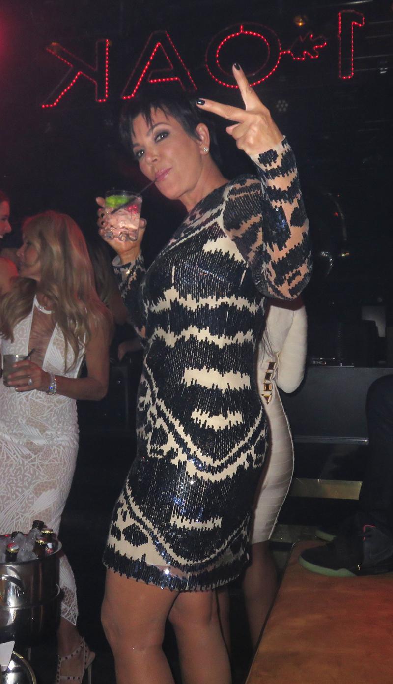 Kris Jenner gives peace sign to camera as she celebrates her 59th bday with boyfriend and friends in Las Vegas