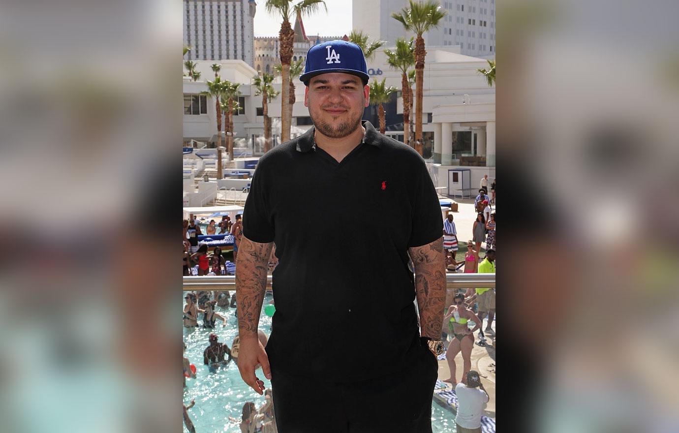 Rob Kardashian Poses By A Pool