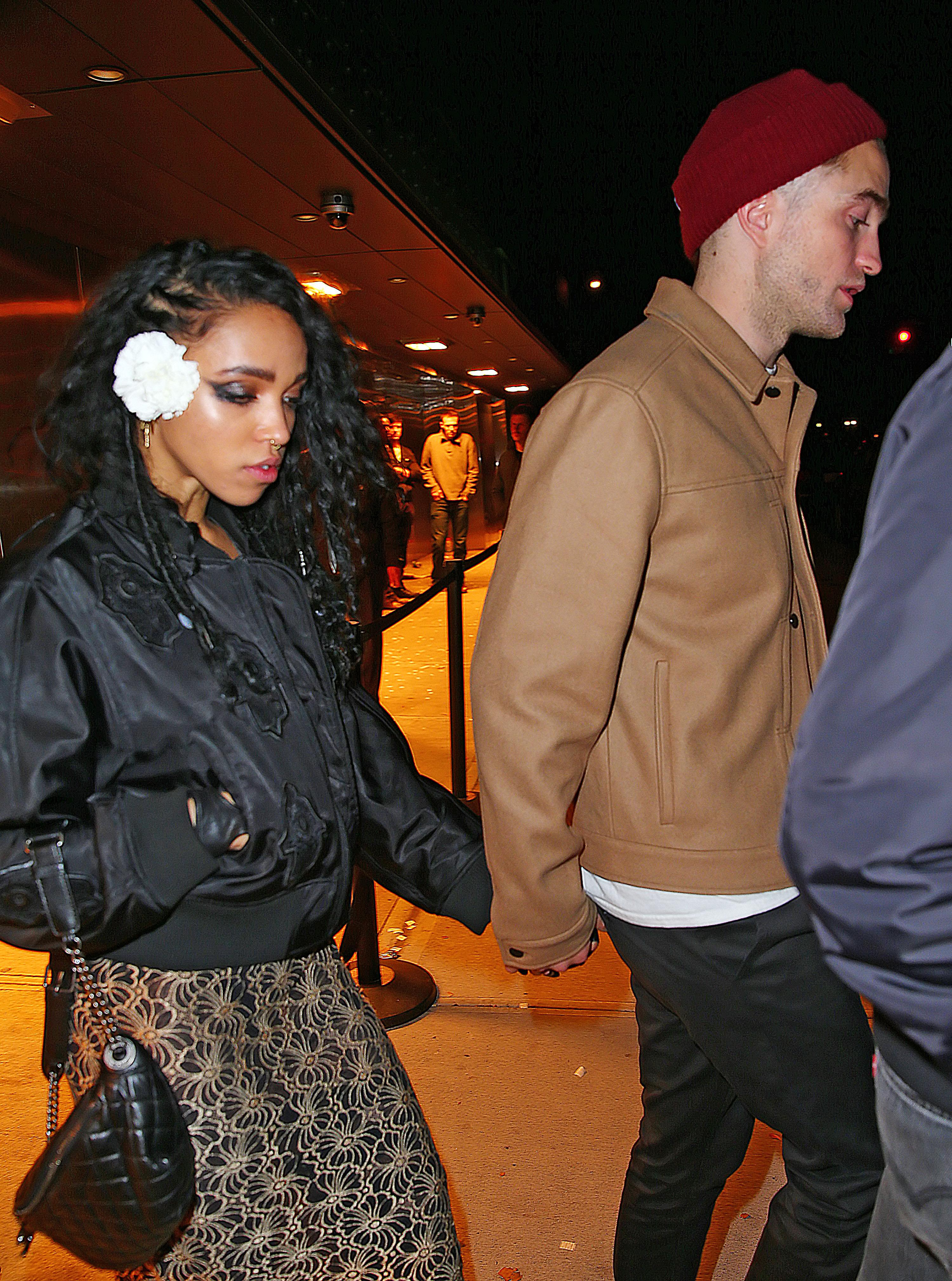 Robert Pattinson and FKA Twigs hold hands when coming out of Melrose Ballroom after hanging out with Rihanna