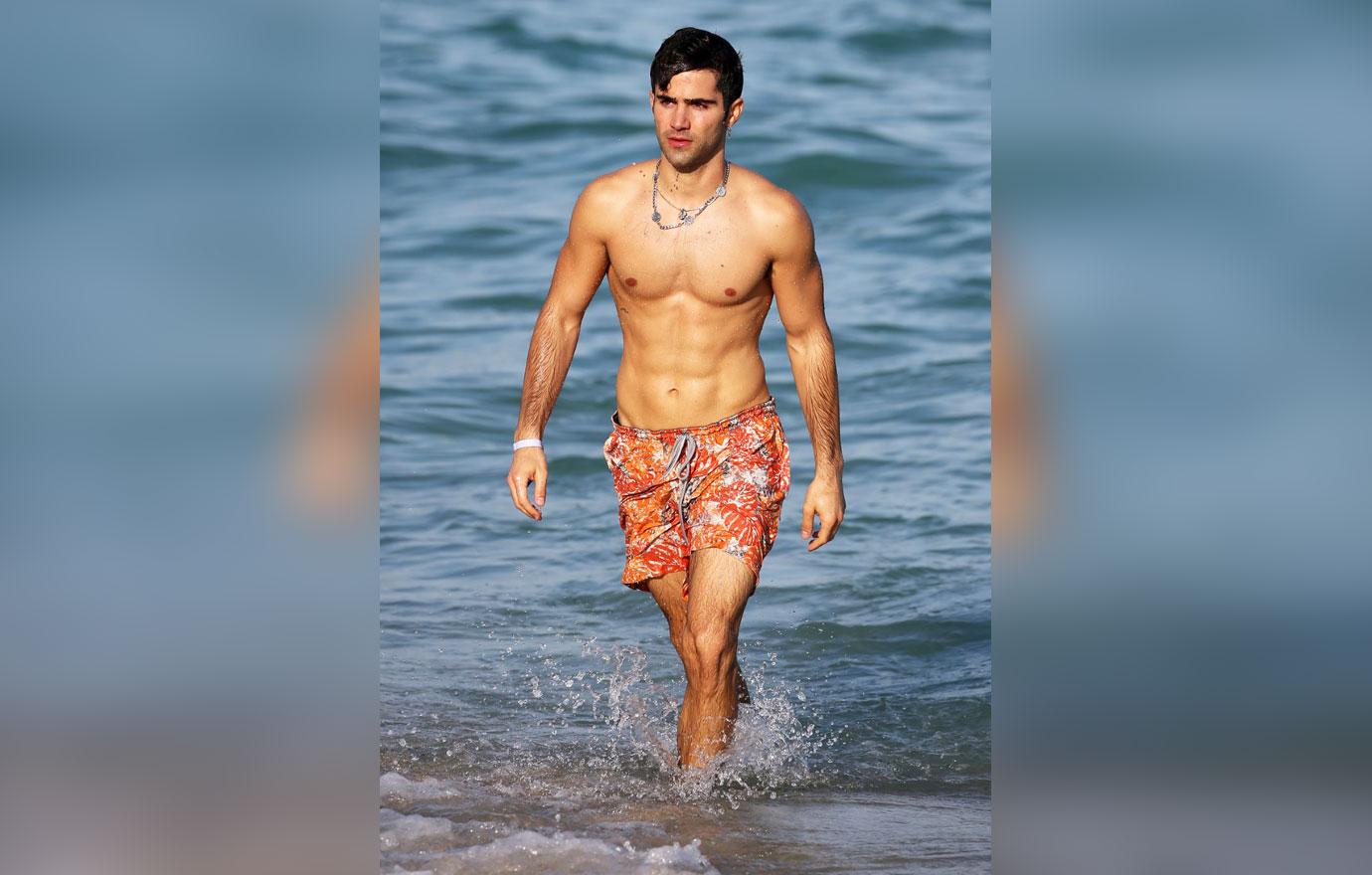 shirtless men on the beach max ehrich