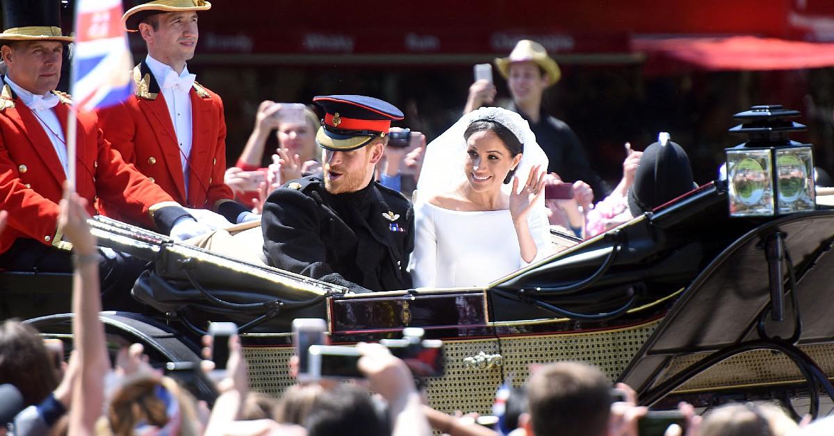 image of Meghan Markle paired the gown with silk satin pumps.