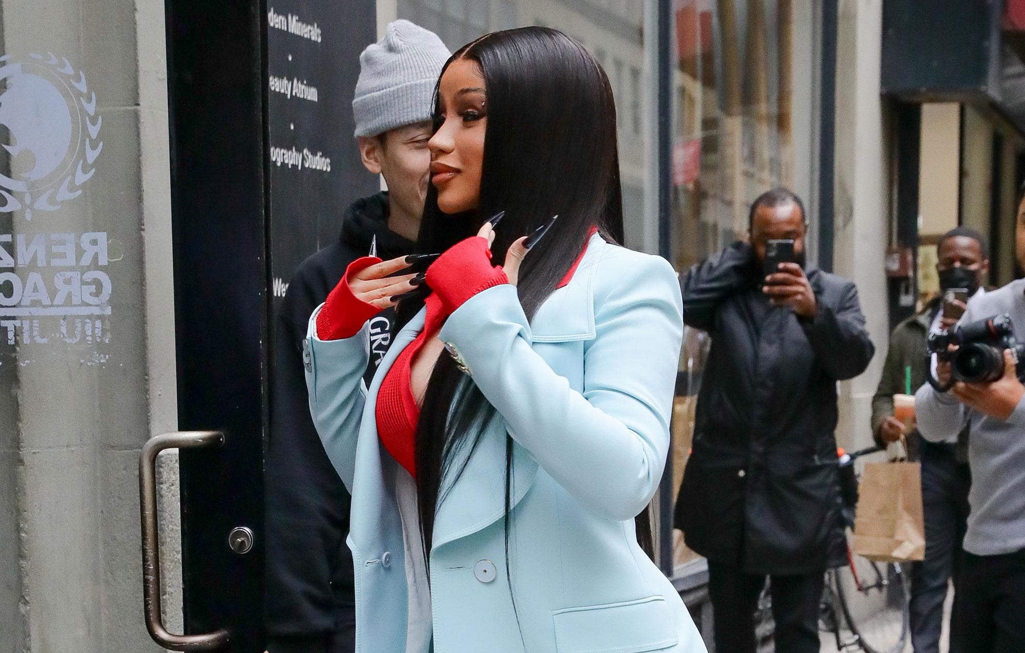 cardi b looks radiant in light bue suit