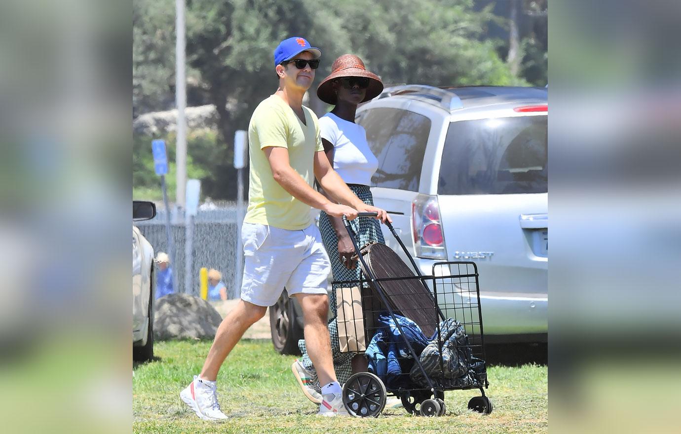 EXCLUSIVE: Joshua Jackson and girlfriend Jodie Turner-Smith kiss as they do a bit of shopping at a local Flea Market joshua jackson girlfriend jodie