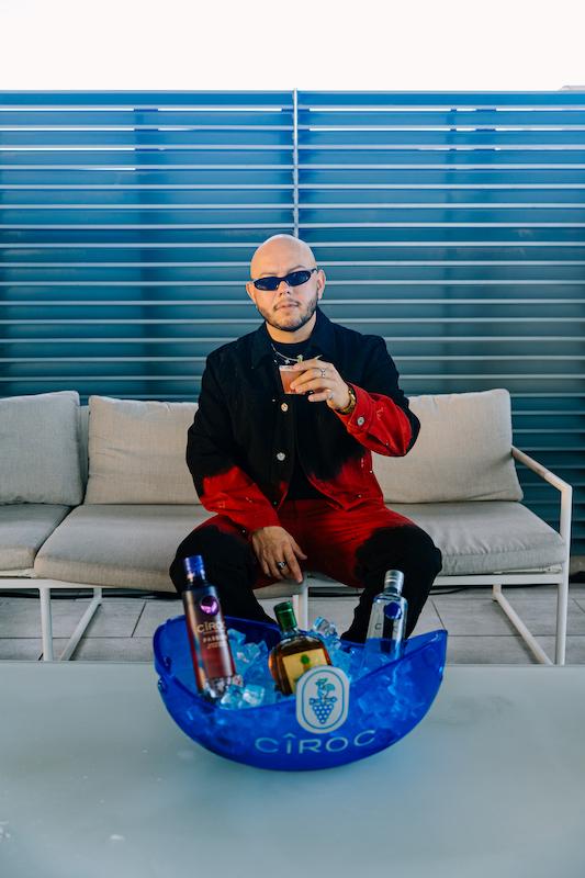 lex borrero celebrates at the art of being latin with ciroc and buchanans whisky cocktails during miami art week