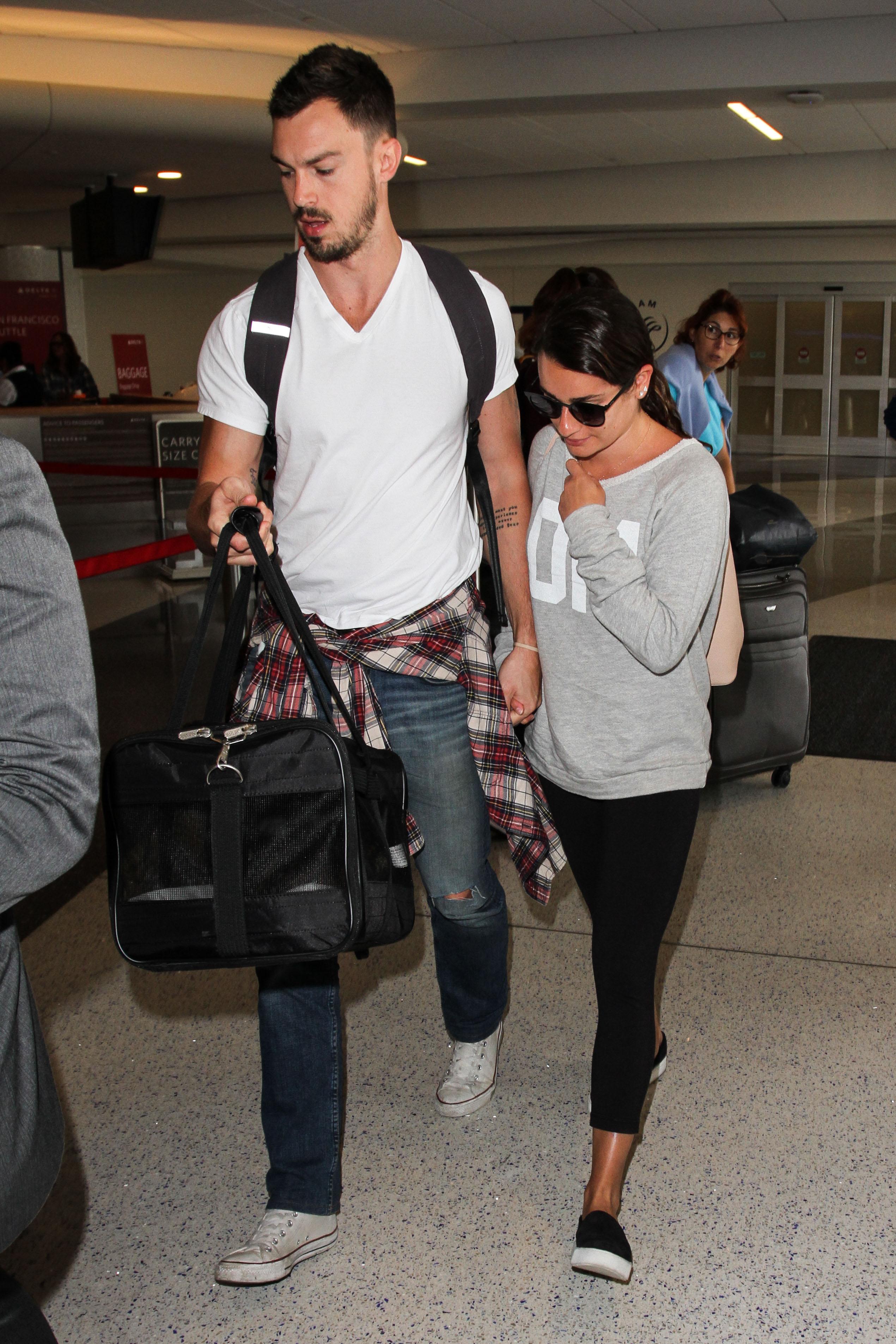 Lea Michele and boyfriend Matthew Paetz seen at LAX Airport