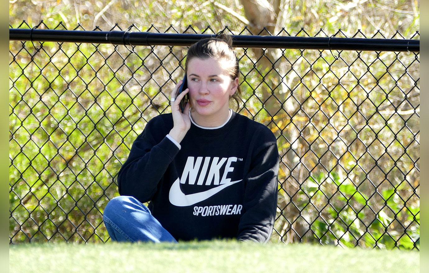 EXCLUSIVE: Ireland Baldwin takes her dogs for a walk in LA.