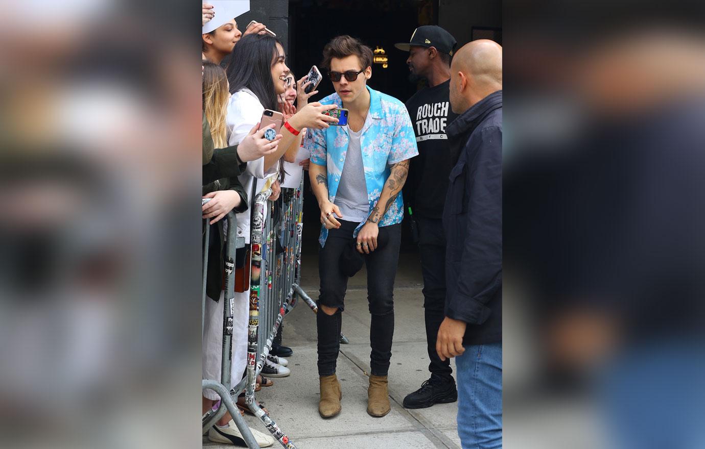 Harry Styles Crushes Fan In World Tour Promo