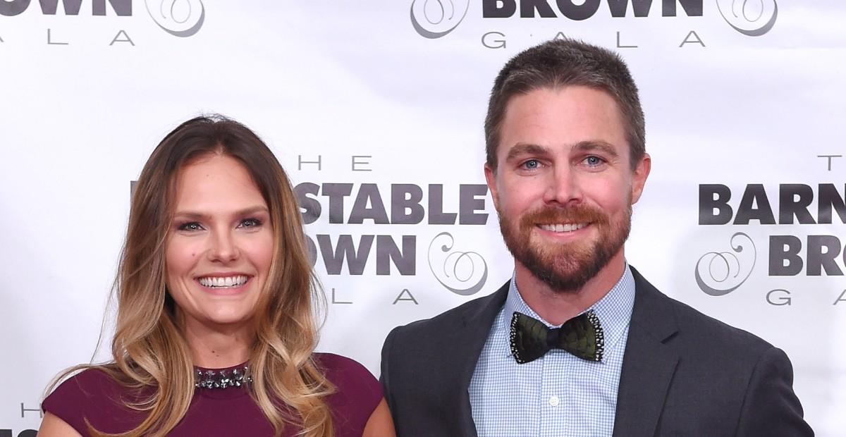 stephen amell breaks silence removal from plane alleged fight wife cassandra jean