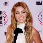 2010__12__MIley_Cyrus_Dec13newsneb 150×148.jpg