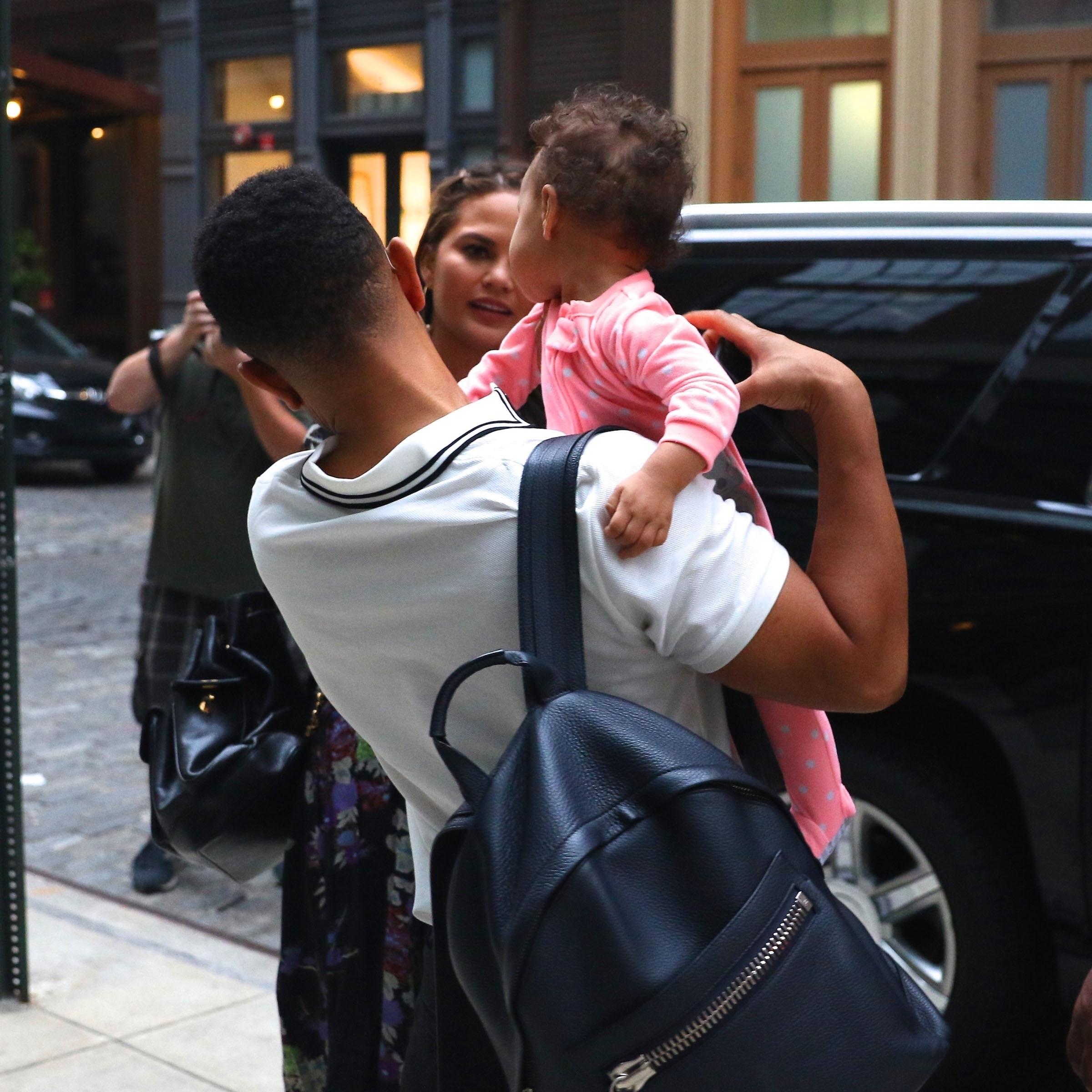 Chrissy Teigen &amp; John Legend check out of their hotel in New York