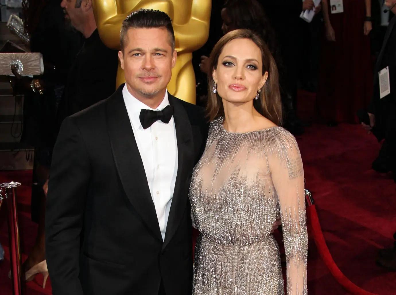 brad pitts abuse angelina jolie started before  plane