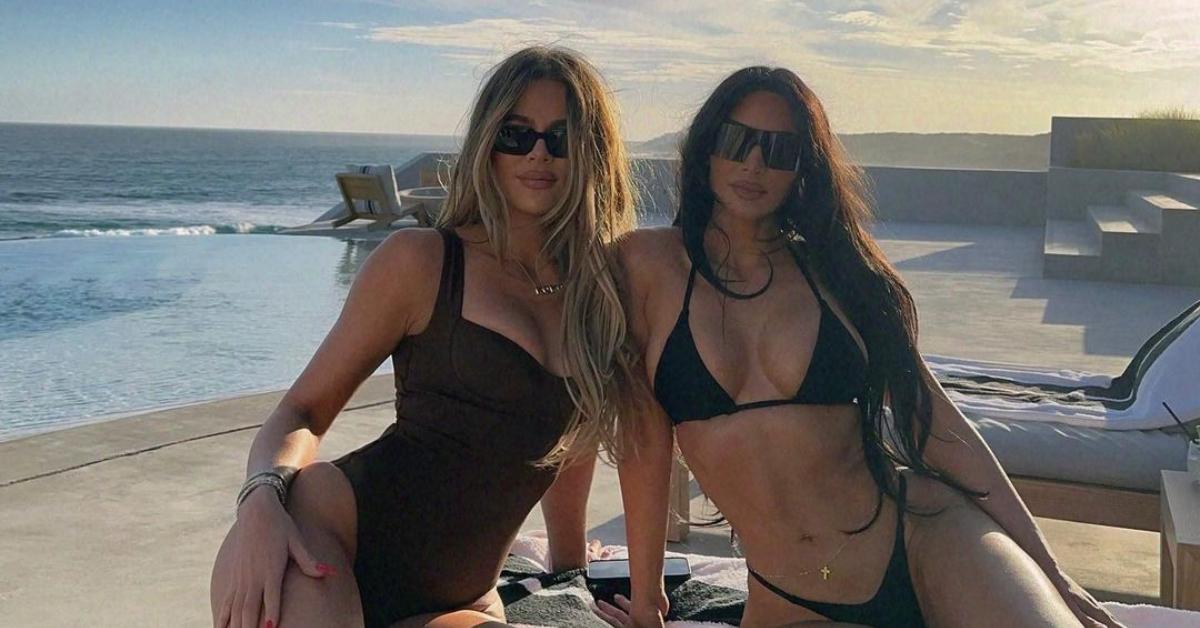 Khloe and Kourtney Kardashian yank down pants to flaunt abs of