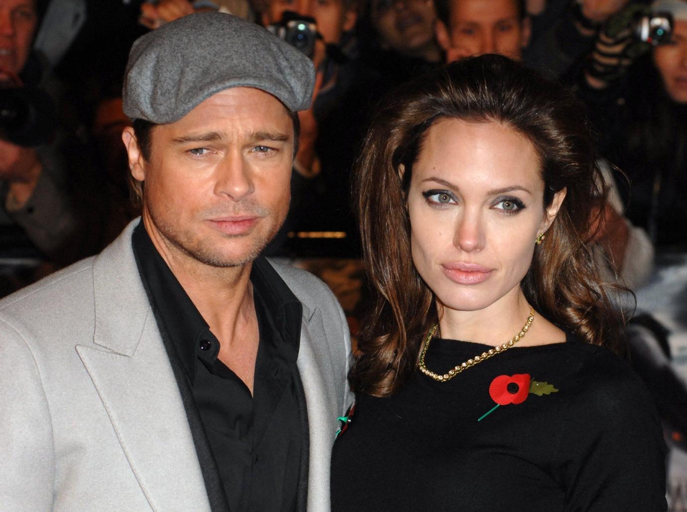 angelina jolie has to live los angeles divorce brad pitt twins turn