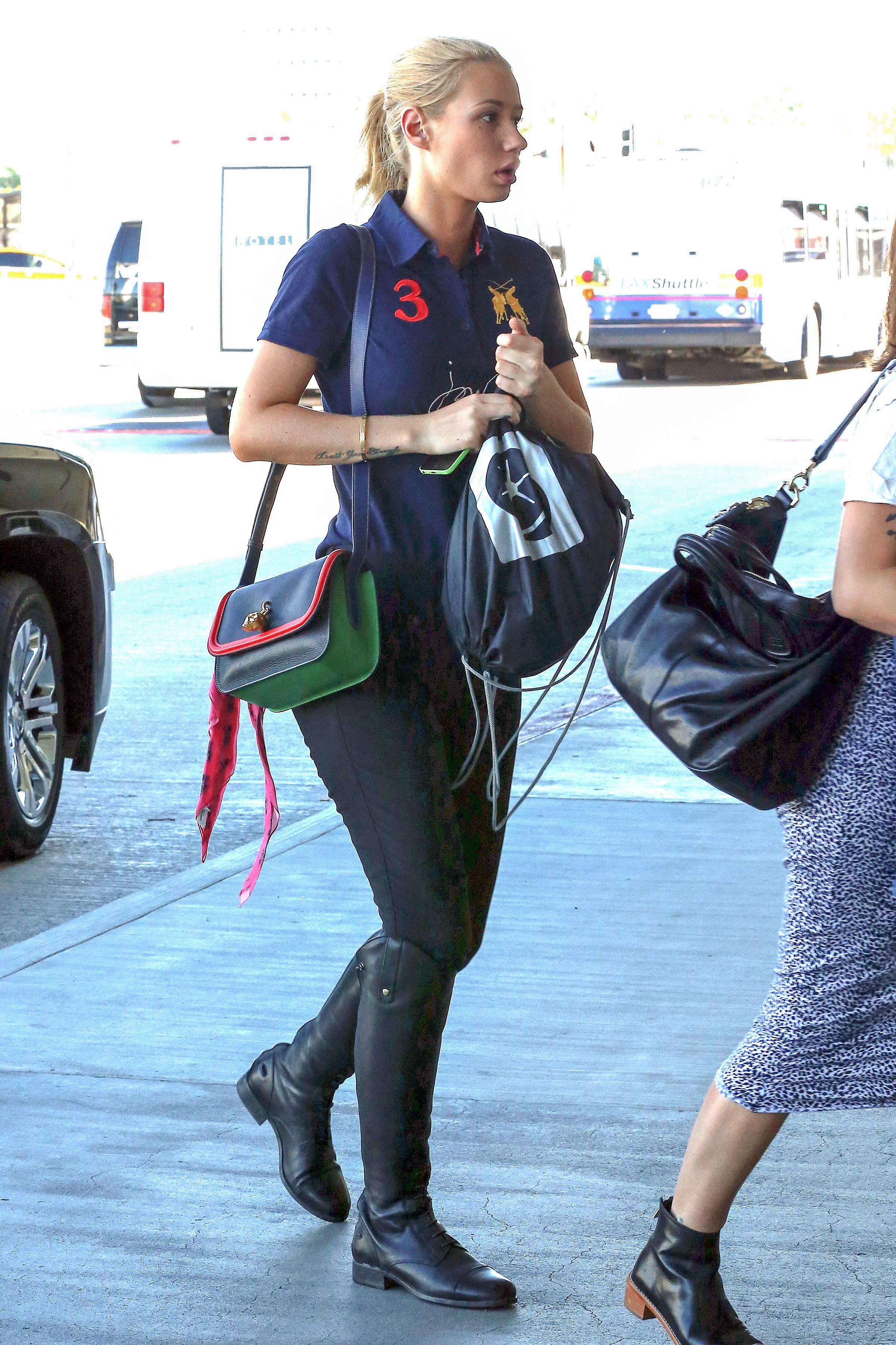 EXCLUSIVE: INF &#8211; Iggy Azalea Goes Equestrian Chic At LAX