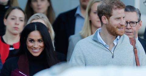 Meghan markle pregnant baby bump photos prince harry first child