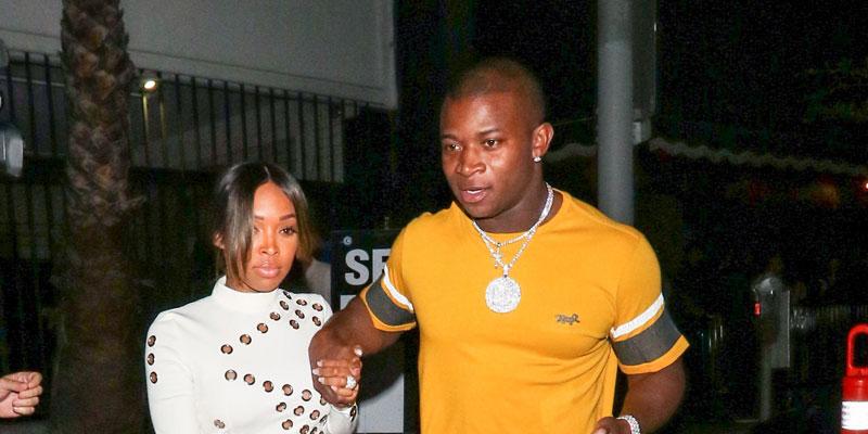 Malika Haqq Holding Hands With O.T. Genasis