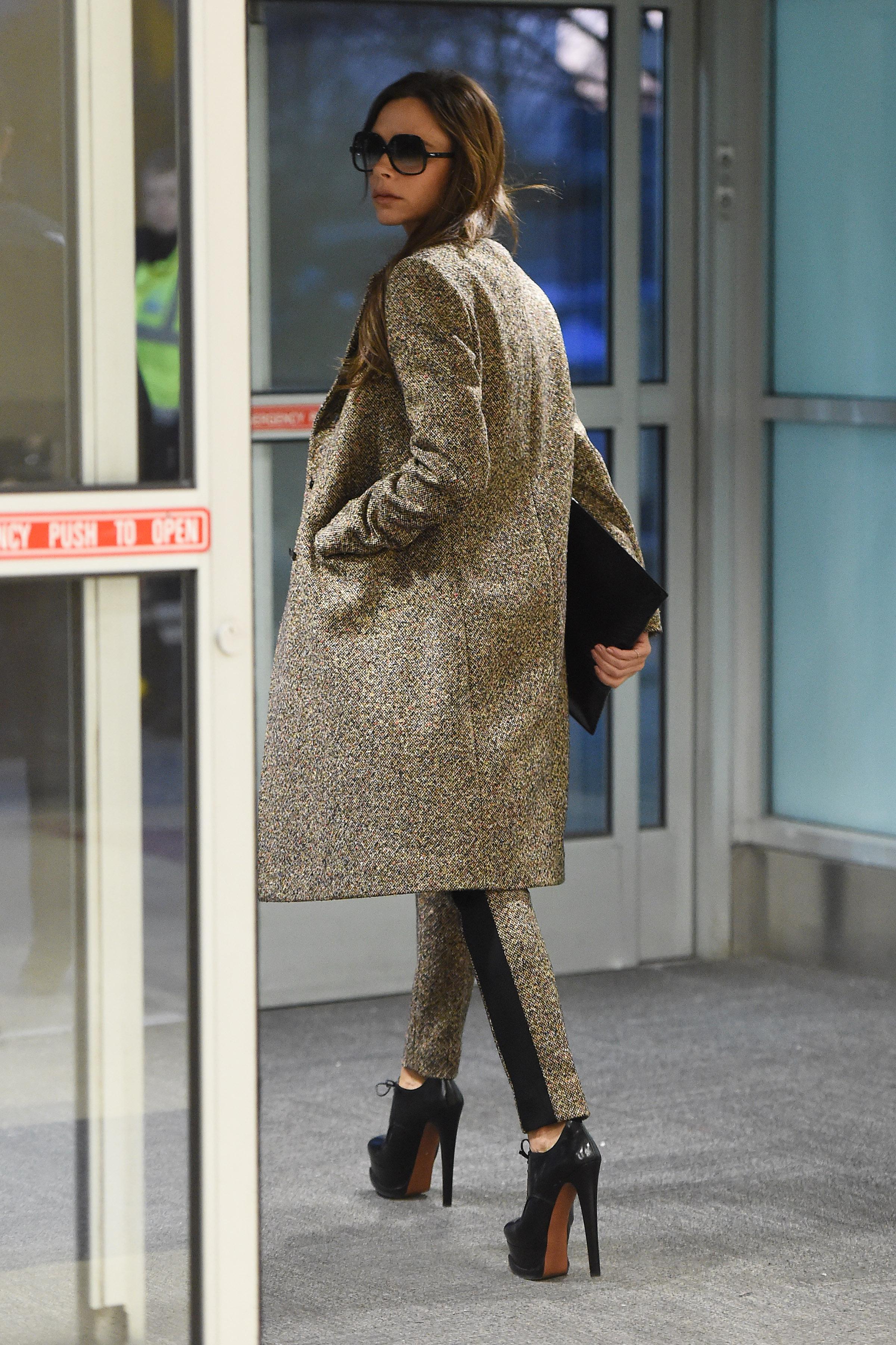 Victoria Beckham arrives at JFK airport in NYC.